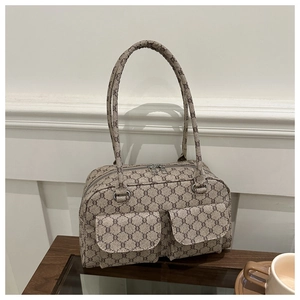 Detail of vintage canvas tote with dual zipper main bag and two front flap pockets