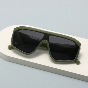 Oversized shield wrap sunglasses in olive green frame with dark lenses for cycling fashion