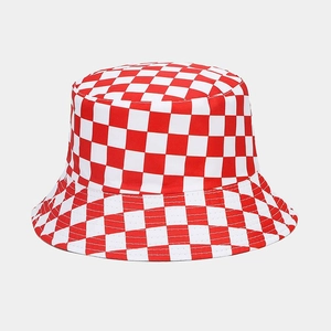 Modern red and white checkerboard reversible bucket hat for sun protection with clean fabric