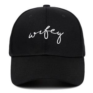 Classic black cotton baseball cap featuring white Hubby embroidery on a 6-panel design
