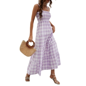 Purple checkered boho maxi dress with smocked bodice and tiered skirt on model