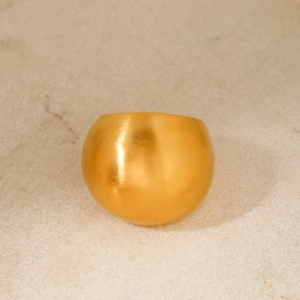 Minimalist wide 18k gold stainless steel dome ring with a brushed matte finish