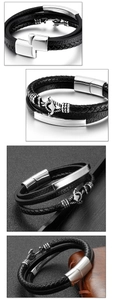 Detailed views of multi-layer black braided leather anchor bracelet with silver clasp