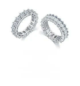 Detailed macro view of S925 sterling silver rings with emerald cut cubic zirconia stones