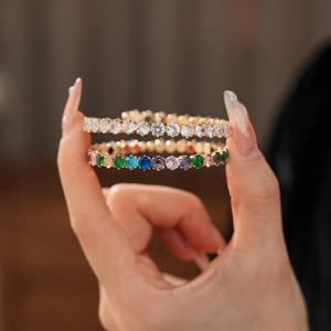 Close-up of rose gold zircon heart bracelets with colorful and clear crystal stones