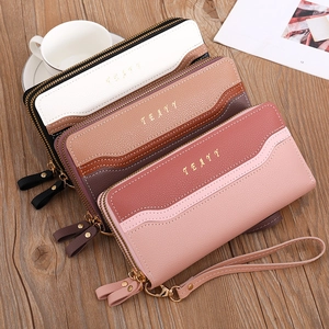 Detail of color-block long wallets with double zippers and detachable wrist strap