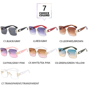 Flat lay of rimless square sunglasses in seven stylish color options on white background