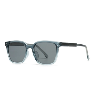 Grey-blue translucent square polarized sunglasses with dark grey lenses and silver rivets
