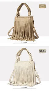 Detailed view of khaki and white tassel handbags with metallic chain strap handles