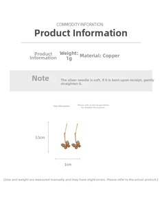 Detail view of gold butterfly tassel earrings showing dimensions of 3.5cm by 1cm