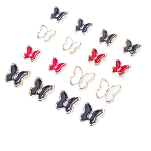 Bijoux à ongles papillons 3D en émail coloré rouge, noir et blanc avec bordure dorée