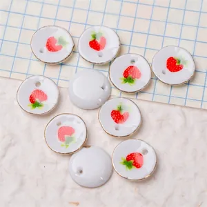 Miniature ceramic strawberry saucer pendant with gold rim for jewelry making 0.3x1.7cm