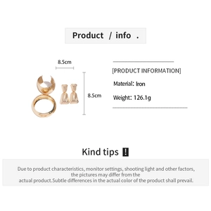 Detail view of gold textured metal bangles with product specs and dimensions