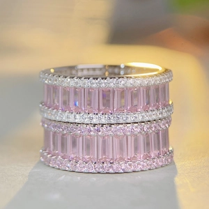 Wide S925 silver eternity band featuring pink rectangular gems and clear round crystals