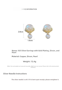 Detailed view of luxury gold-plated earrings with pearls, zircons and silver needle studs