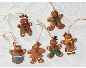 Detailed view of resin gingerbread man Christmas tree ornaments with rustic jute rope ties