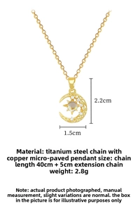 Detailed view of gold moon and sun pendant necklace with dimensions 2.2cm by 1.5cm