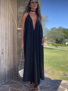 Elegant black deep V-neck sleeveless halter maxi dress for women on summer beach vacation