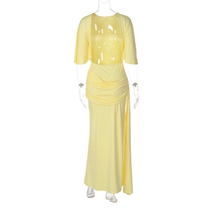 Detailed view of yellow maxi dress featuring elegant pleated waist and draped bodice