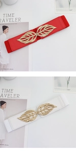Macro shot of elastic waist belt with gold leaf buckle and durable leather finish