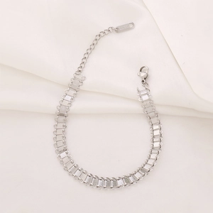 Polished silver stainless steel Cuban link bracelet with adjustable chain and S.STEEL tag