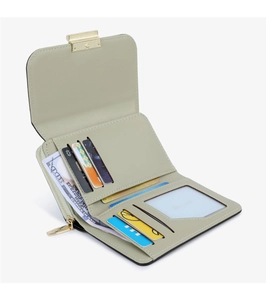 Detail view of light green PU leather wallet showing card slots and cash compartment