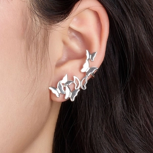 Elegant S925 silver asymmetric butterfly ear cuffs with a polished metallic finish