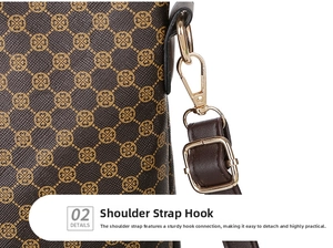 Close-up of champagne gold metal swivel hook and D-ring on dark brown leather bag