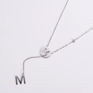 Minimalist silver double-layered necklace with letter M pendants and sparkling zircon stone