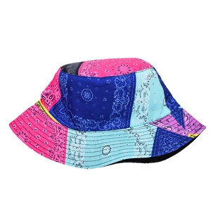 Detail of colorful paisley patchwork pattern on a cotton wide brim bucket hat