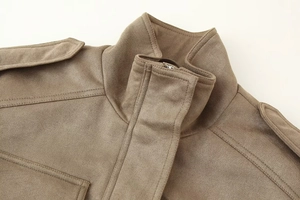Close-up of brown suede jacket detailing the collar, shoulder straps, and zipper