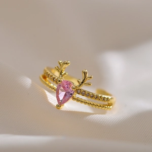 Golden double-layer reindeer horn open ring with pear-shaped pink gemstone