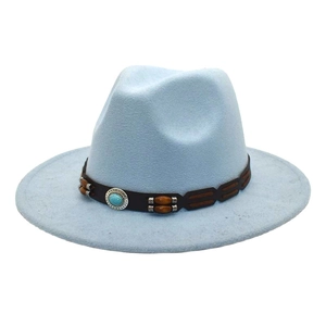 Detail of light blue wool fedora with brown leather band and turquoise bead accent