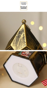 Detail of vintage Christmas lantern featuring Santa painting and metal top hanging ring