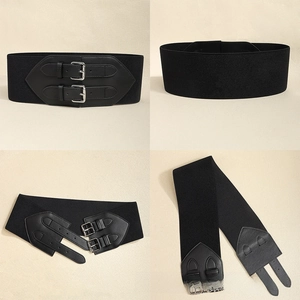 Detail view of black elastic wide waist belt with double pin metal buckle and leather panel