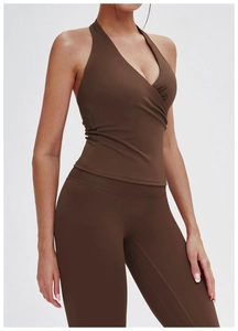Slim fit brown halter yoga top and high waist leggings set made of stretch matte fabric