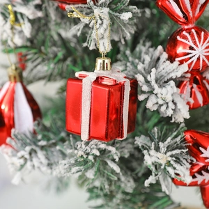 Red Christmas tree ornaments in candy and gift box shapes with glossy metallic finish