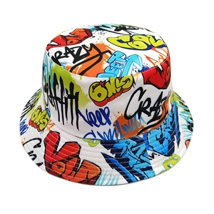 Graffiti print reversible cotton bucket hat featuring colorful street art style lettering