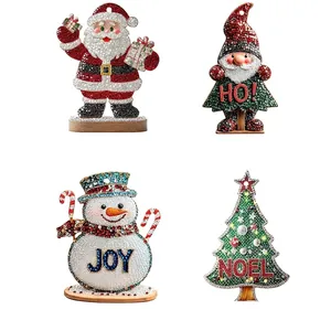 Size chart for Christmas ornaments featuring Santa and tree with metric and imperial units
