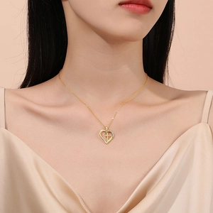 Elegant gold S925 sterling silver heart cross necklace with sparkling diamonds on model