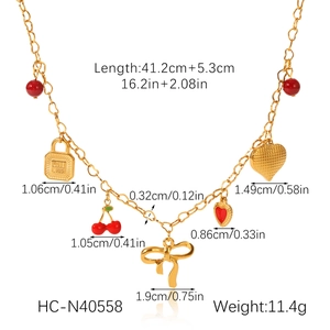 Detailed size and weight specs for gold charm necklace with cherry and love heart pendants