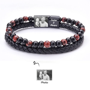 Detail of double-layer leather and map stone bead bracelet with magnetic photo charm
