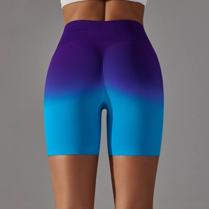 Close-up of seamless purple to blue gradient biker shorts with high waist and lift effect