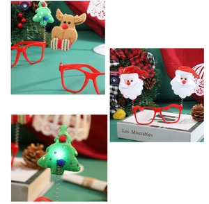 Detail of glowing LED Christmas party glasses with Santa and Reindeer designs