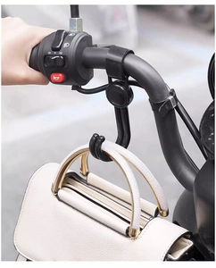 Universal black handlebar hook for electric scooters shown holding a white leather bag