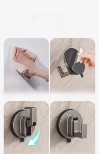 Step-by-step installation guide for gray suction cup hooks on marble walls