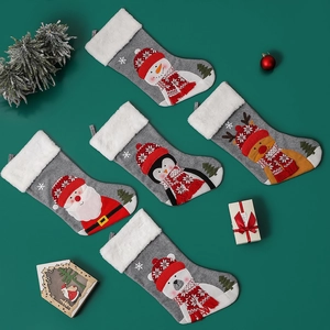 5-pack Christmas stockings with Santa, snowman and deer motifs for holiday home decoration