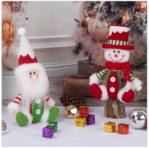 Detail of plush Santa Claus and snowman jars with transparent bases for holiday storage