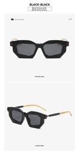Detail view of irregular geometric sunglasses with black frames and yellow spliced temples