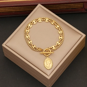 Double-layer gold stainless steel chain bracelet with coffee bean links and cameo pendant